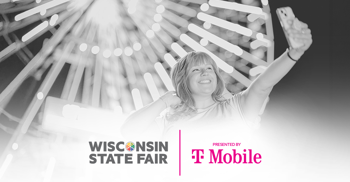 Wisconsin State Fair presented by T-Mobile - girl taking a selfie in front of Ferris wheel