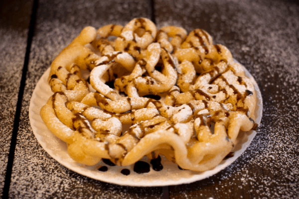 Gluten Free Funnel Cake drizzled with Chocolate
