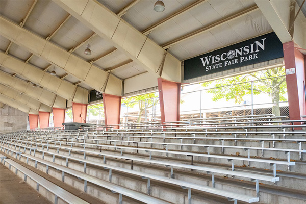 Coliseum bleachers with a Wisconsin State Fair Park sign above